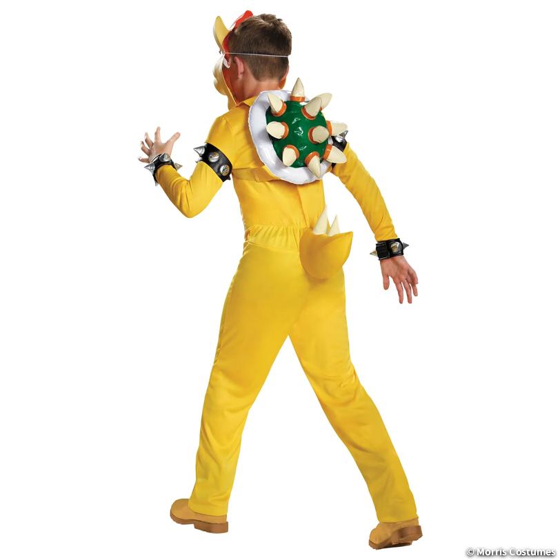Boy wearing the deluxe Bowser costume: yellow jumpsuit, spiked cuffs and Bowser mask, front view