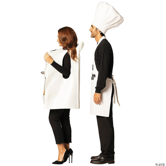 Side view of the couple in the white oven tunic and Bun Maker chef apron and hat