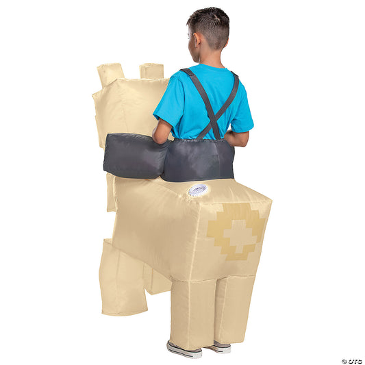 Back view of a boy in the inflatable Minecraft Llama ride-on costume showing straps and pixel details